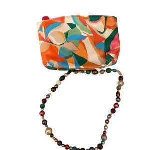 Makeup bag abstract print and beaded necklace